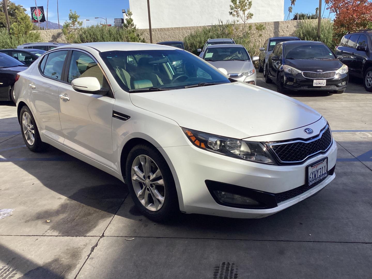 2013 WHITE Kia Optima (5XXGM4A72DG) , AUTOMATIC transmission, located at 30 S. Berkeley Avenue, Pasadena, CA, 91107, (626) 248-7567, 34.145447, -118.109398 - Crown City Motors is a used “Buy Here Pay Here” car dealer in Pasadena CA. “Buy Here Pay Here” financing, means that when you purchase your vehicle from our dealership, that you make the payments to the dealership as well. We do not need the banks approval to get you approved for a used auto - Photo#5